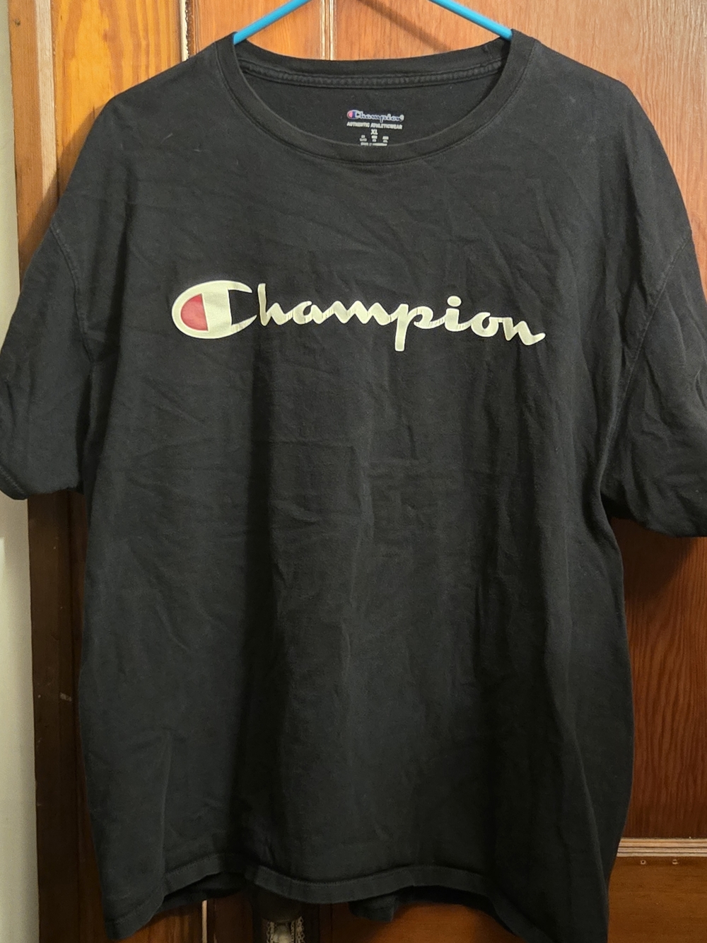 Champion Black Logo Tee with Red Accent